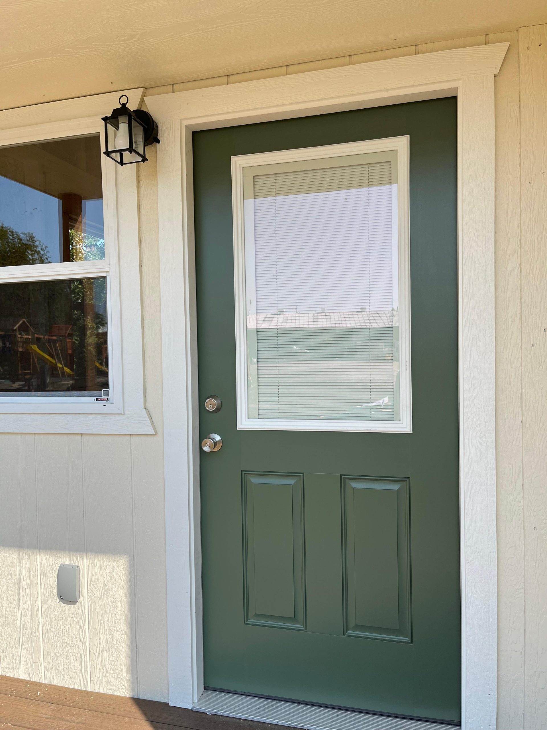 House-style entry door on an Alamo Series shed